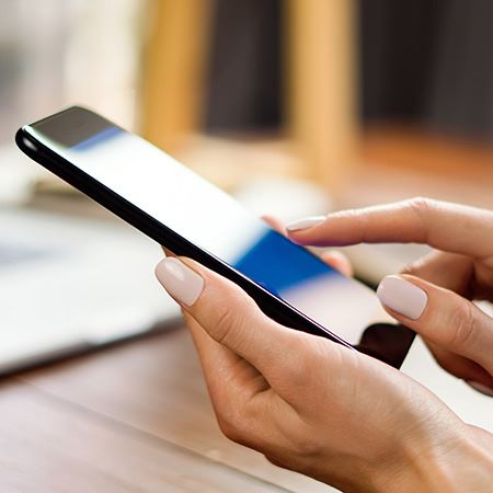 Woman holding a cell phone